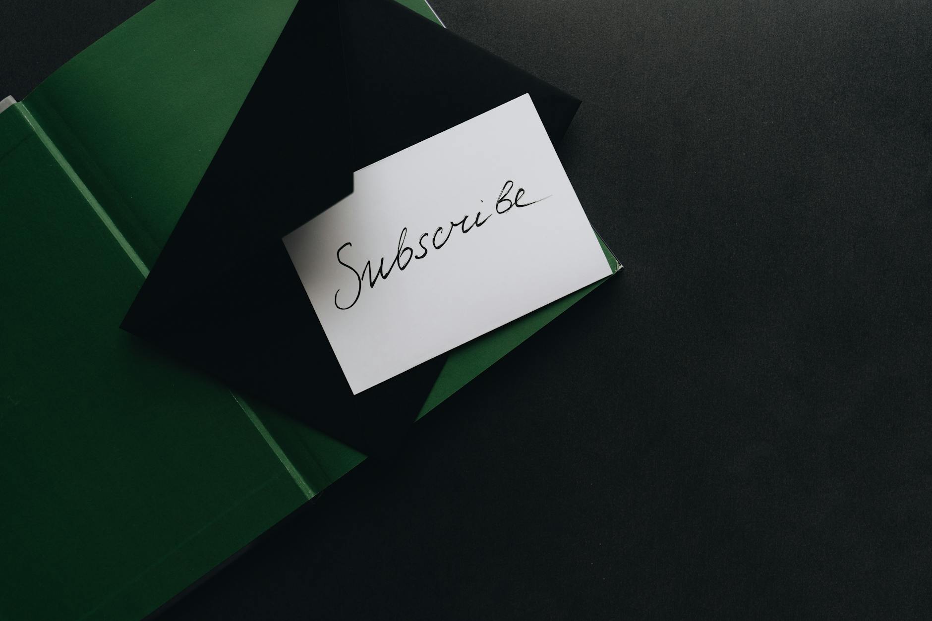 white card on top of an envelope